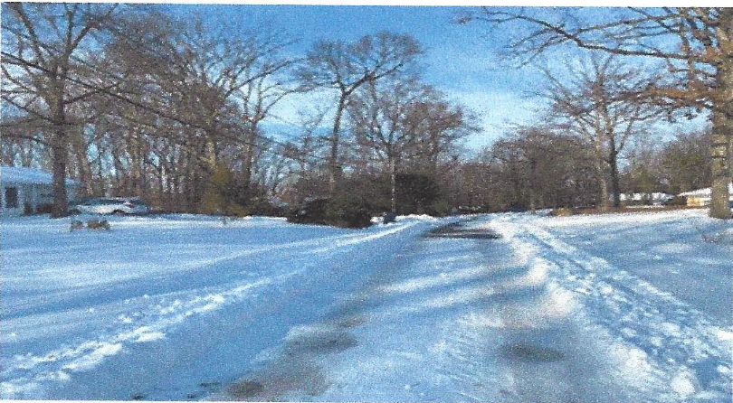 View of Monterey Drive covered in snow.